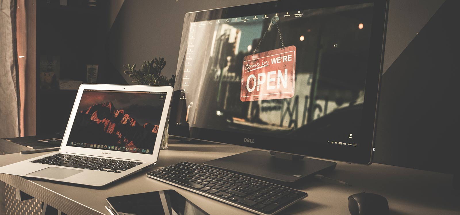 Computer screen displays open for business