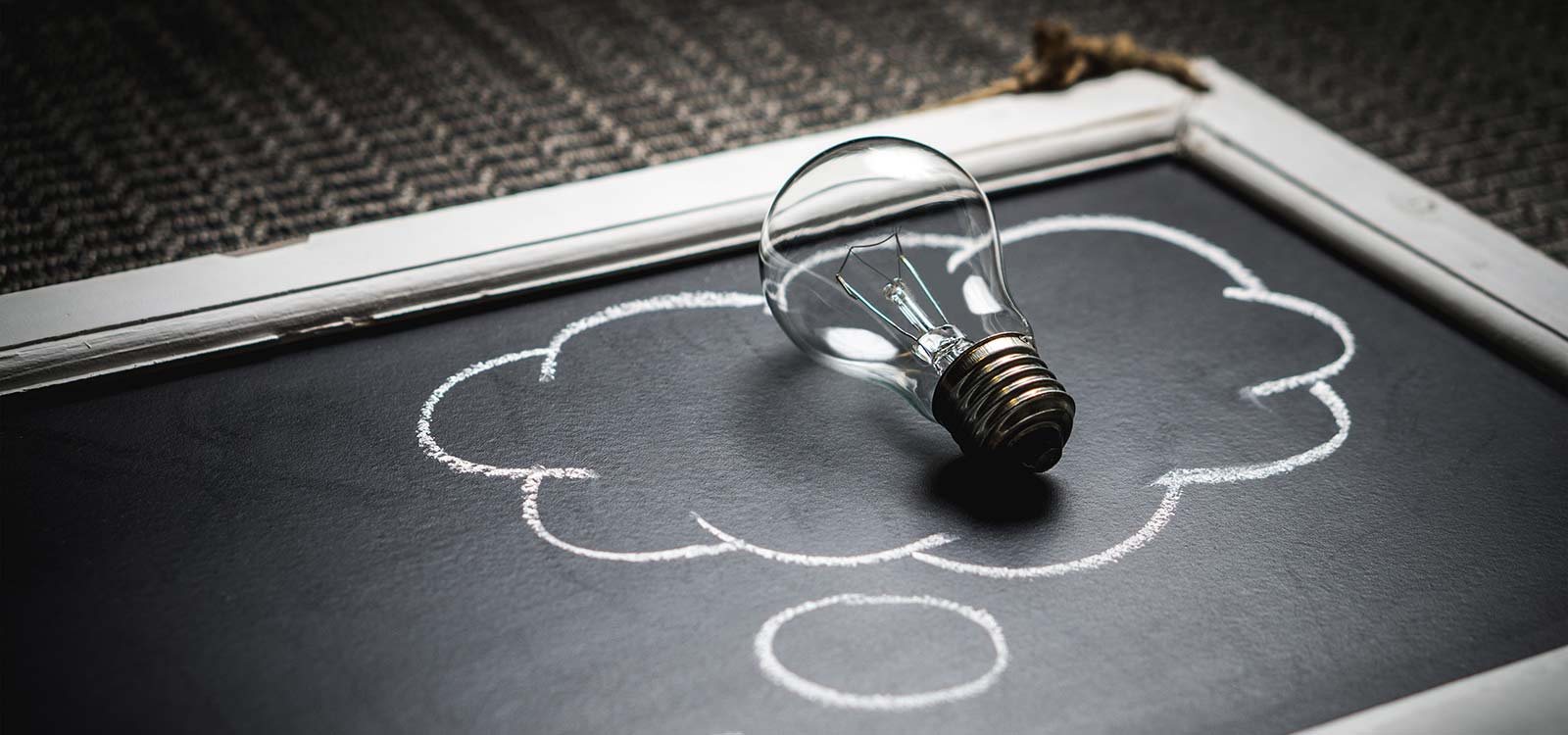 Lightbulb on chalkboard