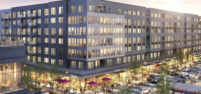 A striking architectural shot of the Merriweather District’s modern, glass-clad tech buildings, representing the digital flagship engineered by Seismic Pixels to mirror the district’s physical innovation.